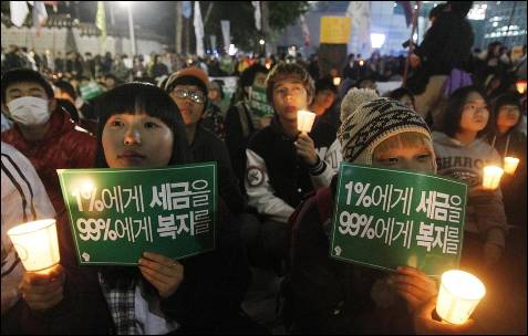 Foto de la manifestación del 15-0 desde Seúl. Los países asiáticos han sido los primeros en sumarse a las movilizaciones globales.-