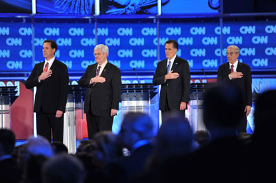 Santorum, Gingrich, Romney y Paul, durante el debate.-