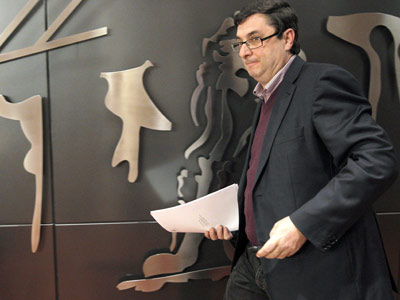José Luis Centella, secretario general del PCE, a la entrada de una rueda de prensa en el Congreso.-