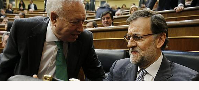 Foto de archivo del ministro de Asuntos Exteriores, José Manuel García-Margallo, y Mariano Rajoy. REUTERS