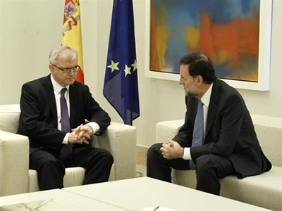 El vicepresidente de la Comisión Europea, Olli Rehn junto a Mariano Rajoy durante su reunión el pasado mes de mayo.- EUROPA PRESS