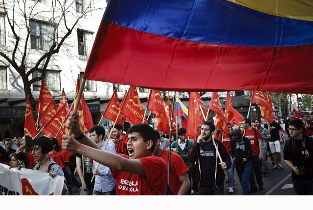 Manifestación de apoyo al Gobierno venezolano de Maduro que tuvo lugar este viernes en Madrid. EFE