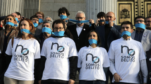 Manifestación a las puertas del Congreso de los Diputados en contra de la 'ley Mordaza'. EFE