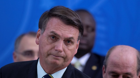 El presidente de Brasil, Jair Bolsonaro, ofrece una rueda de prensa este viernes, en Brasilia (Brasil).  EFE/ Joédson Alves