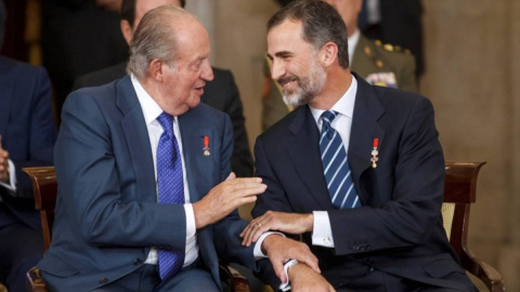 Juan Carlos I y Felipe de Borbón