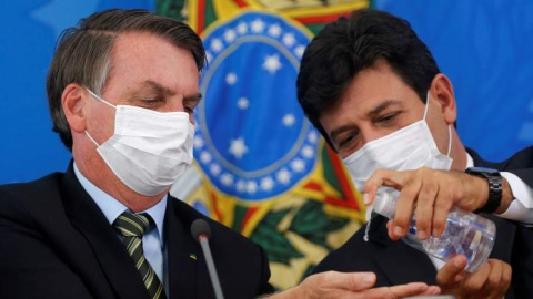 Luiz Henrique Mandetta y Jair Bolsonaro. REUTERS