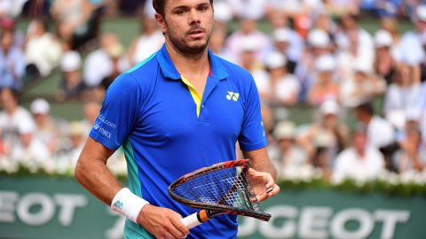 Stanislas Wawrinka tras romper su raqueta en la final de Roland Garros ante el español Rafael Nadal. EFE/Caroline Blumberg