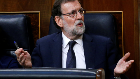 El presidente del Gobierno, Mariano Rajoy, en su escaño, durante la primera jornada de la moción de censura. REUTERS/Juan Medina