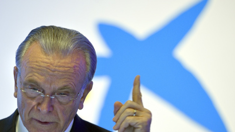 El ahora presidente de la Fundación La Caixa, Isidre Faine, durante su intervención en la presentación de los resultados de Caixabank de 2015, banco que entonces presidía. AFP/LLUIS GENE