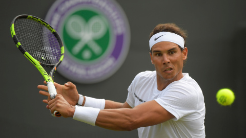 Rafa Nadal en su debut en Wimbledon ante John Millman./REUTERS