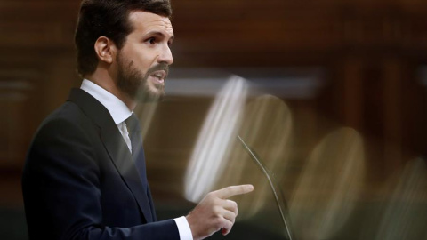 El líder del PP, Pablo Casado, durante su intervención en la segunda sesión del debate de moción de censura presentada por Vox, este jueves en el Congreso. EFE/Mariscal