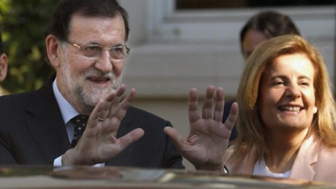 El presidente del Gobierno, Mariano Rajoy, con su ministra de Empleo, Fátima Báñez, impulsora de la reforma laboral de 2012.