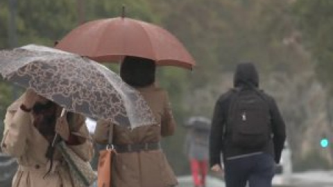 Lluvia y frío para arrancar el puente