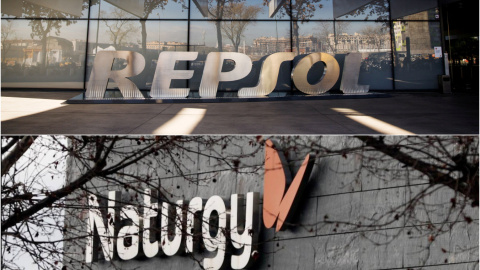 Los logos de Repsol y de Naturgy en sus respectivas sedes en Madrid. REUTERS