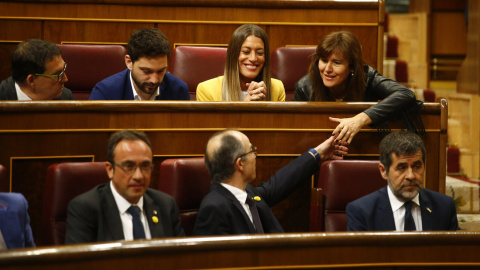 Els exdiputats de JxCat Jordi Sànchez, Jordi Turull i Josep Rull, asseguts als escons del Congrés dels Diputats durant la sessió constitutiva del 21 de maig del 2019.