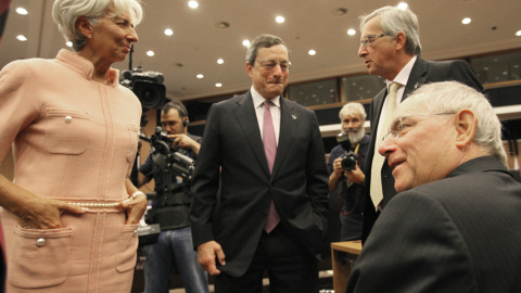 Christine Lagarde, Mario Draghi y Jean-Claude Juncker en una reunión informal del Eurogrupo en Nicosia (Chipre). AFP/ Yiannis Kourtoglou