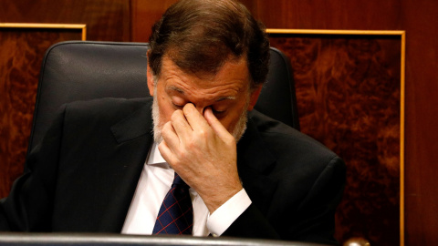 El presidente del Gobierno, Mariano Rajoy, este miércoles, en el pleno del Congreso donde la oposición le interpeló por la presunta financiación irregular del PP. REUTERS/Paul Hanna