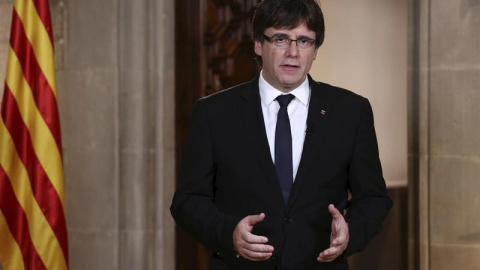 El presidente Puigdemont durante su mensaje institucional. | EFE