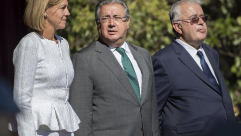 El ministro del Interior, Juan Ignacio Zoido,c., y el director general de la Guardia Civil, Juan Manuel Holgado,d., y la ministra de Defensa, Maria Dolores de Cospedal, en el acto central de la festividad de la patrona de la Guardia Civil,celebrado hoy en