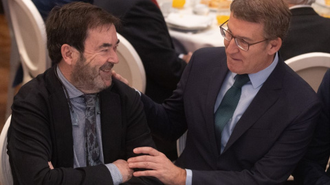 El presidente del CGPJ, Vicente Guilarte, y el presidente del Partido Popular, Alberto Núñez Feijóo, durante un desayuno el 15 de enero de 2024, en Madrid.