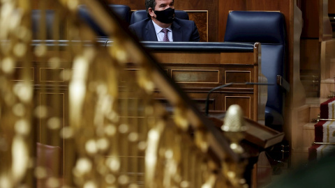 El ministro de Inclusión, Seguridad Social y Migraciones, José Luis Escrivá, durante el Pleno del Congreso que se celebra, este jueves, en Madrid.