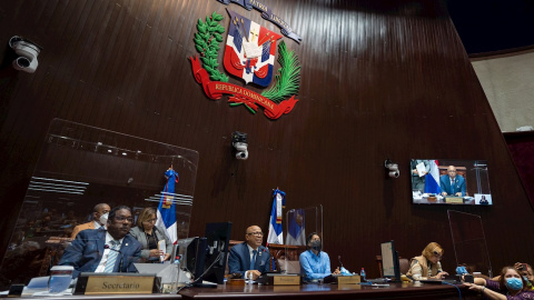 21/12/2021 Miembros de la Cámara de Diputados dominicana asisten a una sesión para votar de nuevo el Código Penal