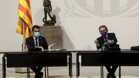 El presidente de la Generalitat, Pere Aragonès, junto al Conseller de Economía Jaume Giró (d) este martes 20 de julio de 2021.