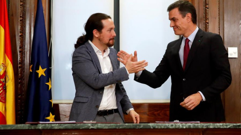 Pedro Sánchez y Pablo Iglesias en la presentación del documento para el Gobierno de Coalición. | EFE