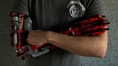 David Aguliar poses with his prosthetic arm built with Lego pieces during an interview with Reuters in Sant Cugat del Valles, near Barcelona, Spain, February 4, 2019. Picture taken on February 4, 2019. REUTERS/Albert Gea