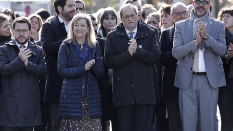 El conseller de Interior, Miquel Buch junto al presidente de la Generalitat, Quim Torra y la expresidenta de la AMI, Neus Lloveras. EFE