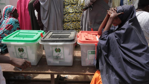 A Nigerian voter waits to cast her ballot in the presidential elections in Kano, Nigeria 23 February 2019. Nigerians head to the polls to vote in the presidential and parliamentary elections after being delayed by one week by the Independent National Ele