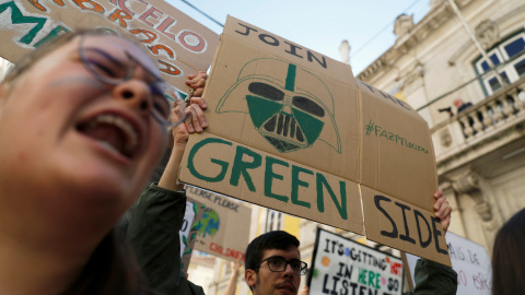 El Lisboa, los estudiantes se suman a la protesta para exigir medidas contra el cambio climático. / Reuters