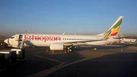 Workers service an Ethiopian Airlines Boeing 737-800 plane at the Bole International Airport in Ethiopia's capital Addis Ababa, January 26, 2017. REUTERS/Amr Abdallah Dalsh/File Photo