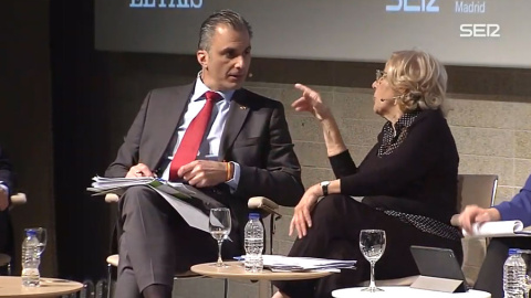 Javier Ortega Smith y Manuela Carmena, durante el debate.