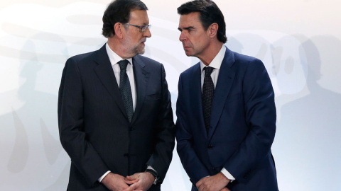 José Manuel Soria junto a Mariano Rajoy durante el acto en Ifema esta semana. EFE