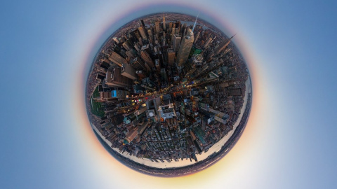 La ciudad de Nueva York, vista durante el atardecer. Donde Central Park se oculta en la zona izquierda de la fotografía / AirPano