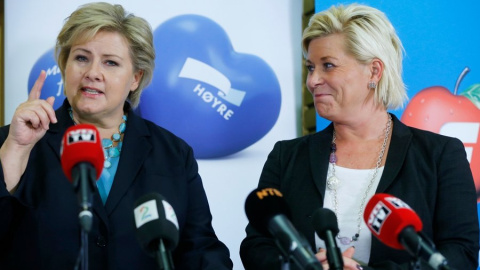 La primera ministra noruega, la conservadora Erna Solberg (izq.), junto a su socia de Gobierno, Siv Jensen, del populista de ultraderecha Partido del Progreso.- REUTERS