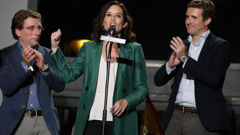 26/05/2019 - El presidente del PP Pablo Casado, la candidata a la Comunidad de Madrid, Isabel Díaz Ayuso, y al Ayuntamiento, José Luis Martínez-Almeida, durante la celebración de los resultados electorales | EFE/ Javier Lizón