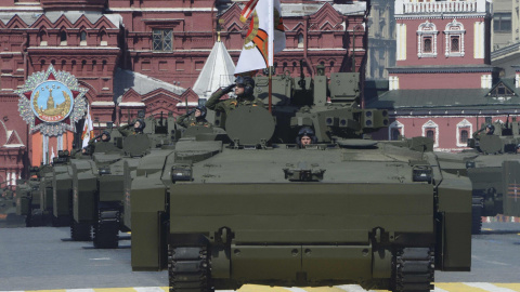 Russian Kurganets-25 armoured personnel carriers drive during the Victory Day parade at Red Square in Moscow. REUTERS/Host Photo Agency/RIA Novosti