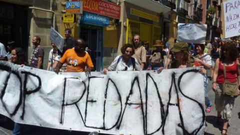 Manifestantes en una protesta contra las redadas racistas.