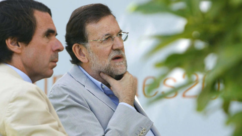 Aznar y Rajoy en el Campus de Verano FAES 2014.- EFE