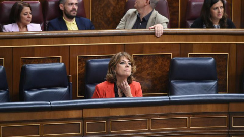 La ministra de Justicia, Dolores Delgado, en su escaño durante el pleno del Congreso de los Diputados. EFE/Fernando Villar