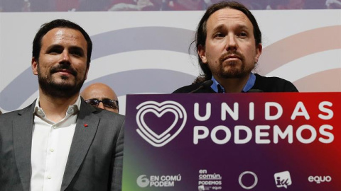 El candidato de Unidas Podemos, Pablo Iglesias (d), junto al coordinador federal de IU, Alberto Garzón. - EFE