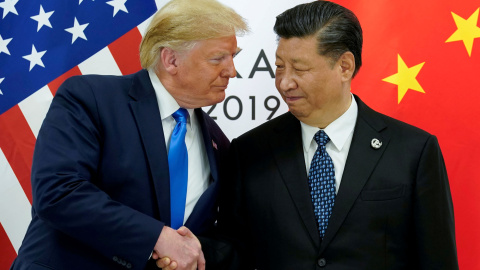 El presidente estadounidense, Donald Trump, junto a su homólogo chino, Xi Jinping, en la cumbre del G20. / Reuters