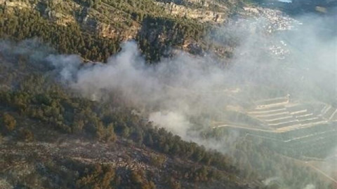 El incendio de Bolbaite quema 1.535 hectáreas y el de Carcaixent 1.224