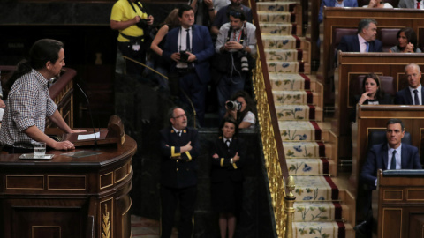 El líder de Unidas Podemos, Pablo Iglesias, en la tribuna del Congreso de los Diputados durante el debate de investidura de Pedro Sánchez, el pasado julio. REUTERS/Sergio Perez