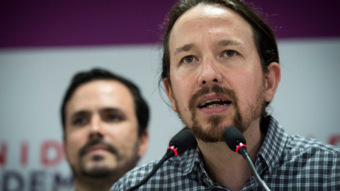 El líder de Podemos, Pablo Iglesias, comparece junto al coordinador general de IU, Alberto Garzón, tras conocer el resultado de las elecciones en Andalucía. EFE/Luca Piergiovanni