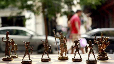 Chess pieces depicting Greek gods and Spartan soldiers on display in a shop in Athens, Greece July 11, 2015. Skeptical European finance ministers gathered on Saturday to decide whether to negotiate a third bailout for Greece after Prime Min