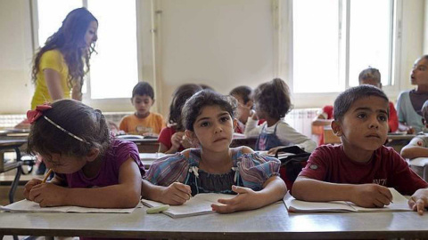 14/05/2016 - Niños sirios en una escuela de la ONU. / EFE