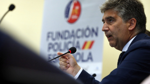 El director general de la Policía, Ignacio Cosidó, durante la inauguración hoy del curso de verano de la Universidad Complutense "Libertad y seguridad frente a las nuevas amenazas" en el que intervendrán el fiscal jefe de la Audiencia Nacio